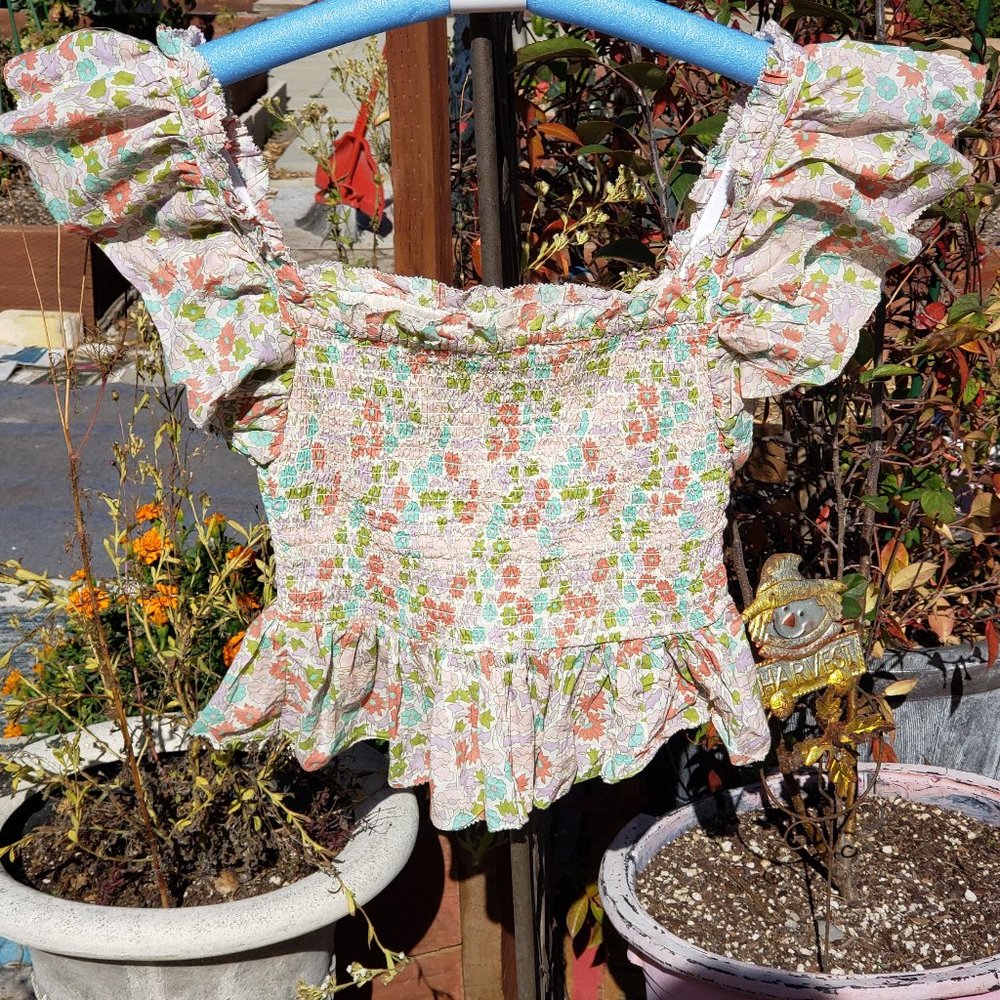 Ines Ivory. Smocked Anthropologie Cream Floral Ruffle Crop Top